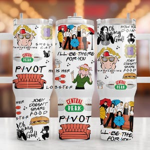 May include: Three white stainless steel tumblers with handles, decorated with cartoon graphics and text from the TV show "Friends." The designs include the Central Perk logo, a red couch, and character illustrations. The tumblers are designed for cold and hot beverages.
