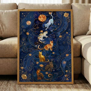 May include: A rectangular wall art print in a wooden frame featuring six cats in various poses against a deep blue marbled background. The design includes gold swirling lines, small flowers, and circular celestial bodies scattered throughout.