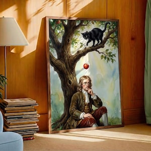 May include: A framed print depicts a man sitting under a tree with a black cat and a hanging apple. The man is dressed in period clothing. The artwork has a whimsical, illustrative style with a light and airy color palette.
