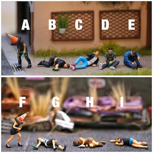 May include: A set of nine miniature figures, some wearing orange traffic cones on their heads, are posed in various positions. Some are sitting, some are lying down, and some are standing. The figures are all wearing casual clothing and are made of plastic.