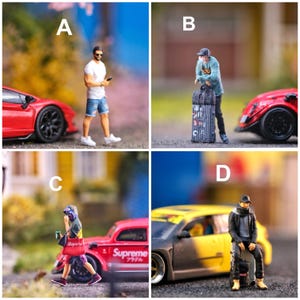 May include: Four miniature figurines labelled A, B, C, and D. A shows a person in a white t-shirt and blue shorts near a red car. B shows a person with a suitcase near a red car. C shows a person with a red bag near a red car. D shows a person sitting on a suitcase near a yellow car.
