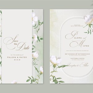 Pu&ograve; includere: Invito di nozze "Save the Date" con un design floreale con rose bianche e foglie verdi. L'invito include i nomi Paloma & Mateo e la data 28.10.22. La seconda carta include i nomi Paloma Aloma e Mateo, la data marted&igrave; 25 ottobre 2022, la posizione Victoria Hotel e il testo Ricevimento a seguire.