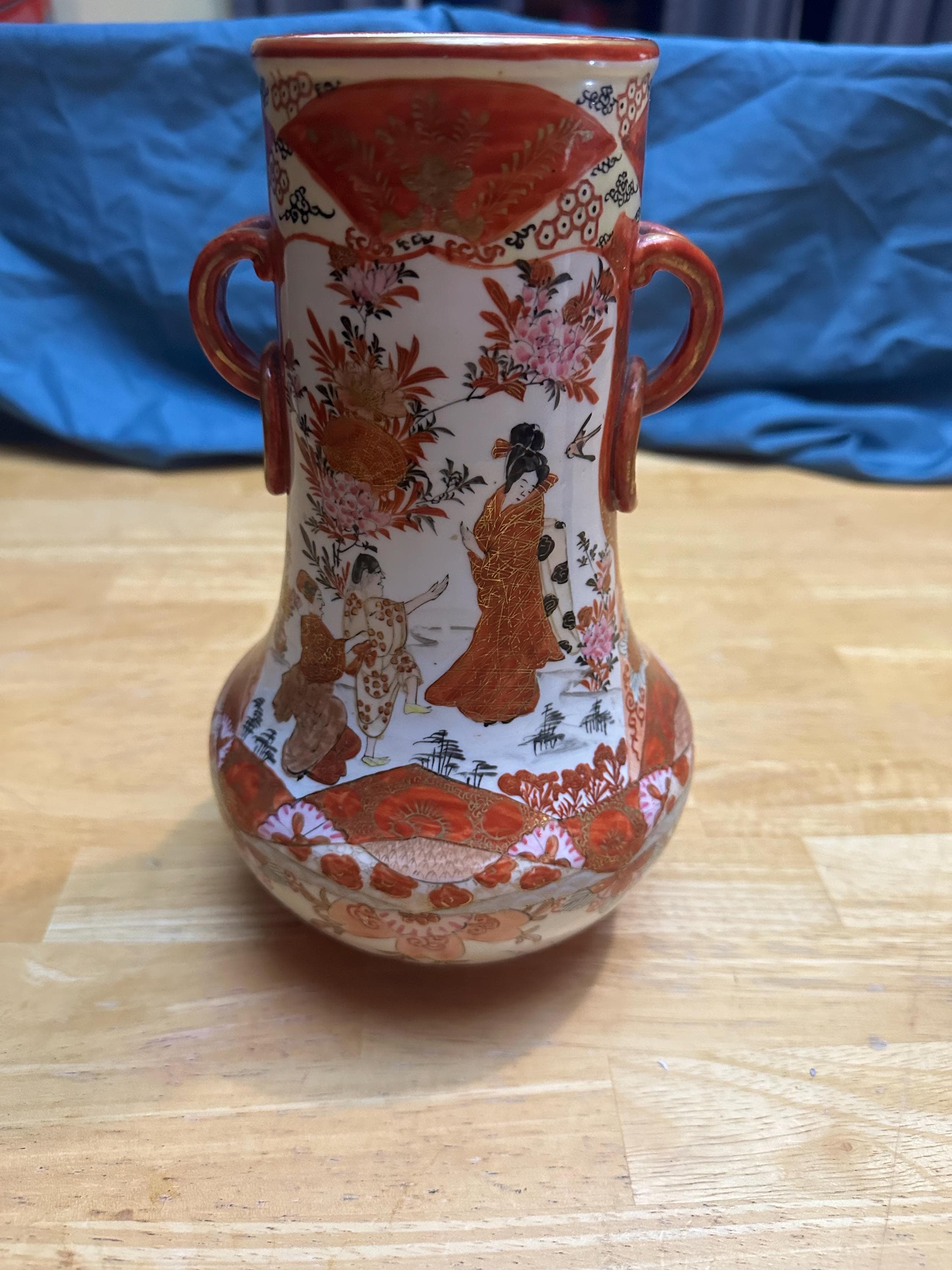 This is Early 20th Century Japanese Kutani Porcelain Vase
