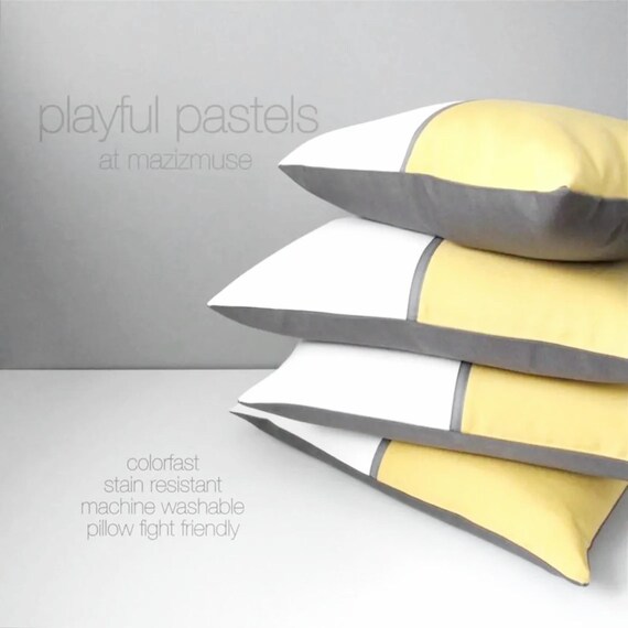 Yellow and white outdoor pillows sale
