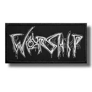 May include: Black rectangular patch featuring the word "WORSHIP" in white, with a dripping font style. The patch is designed for application on clothing or accessories, with a gothic or metal theme.