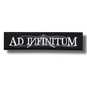 May include: A black rectangular patch featuring the words "AD INFINITUM" in white, decorative lettering. The patch has a dark background and a shadow effect, suitable for clothing or accessories.