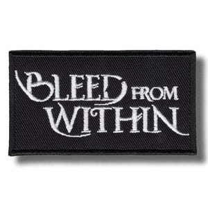 May include: A black rectangular patch featuring the embroidered words "BLEED FROM WITHIN" in white. The patch has a black border and is likely made of fabric. The text is in a decorative font.
