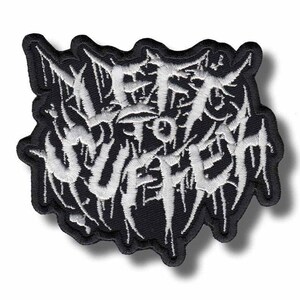 Pode incluir: Patch bordado preto com as palavras "Left to Suffer" em branco, com letras góticas estilizadas. O patch tem uma borda irregular e irregular. O design é uma declaração ousada.