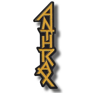 May include: Embroidered patch featuring the word "ANTHRAX" in gold thread on a black background. The letters are stylized and vertically aligned, with a shadow effect. The patch has a black border.