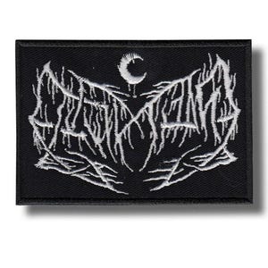 May include: Black rectangular patch with white embroidered gothic lettering and a crescent moon. The patch features a stylized design with sharp, angular lines and a dark aesthetic. Suitable for jackets, bags, or other fabric items.