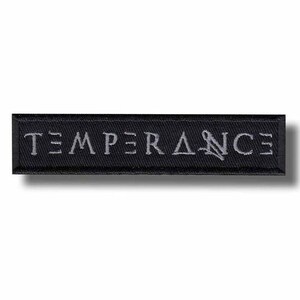 May include: A rectangular black embroidered patch with the word "TEMPERANCE" in light gray thread. The patch has a simple, clean design, with the text centered and evenly spaced.