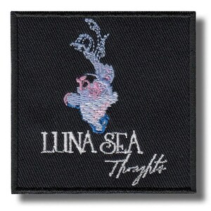 May include: Square black patch with embroidered design. The design features a light blue and pink abstract shape with the words "LUNA SEA Thoughts" in white script. The patch has a black border.
