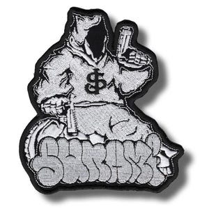 May include: Embroidered patch featuring a hooded figure holding a gun and a money bag with a dollar sign. The patch has a black border and the word "SUBURB" in graffiti-style lettering. The design is primarily black and white.