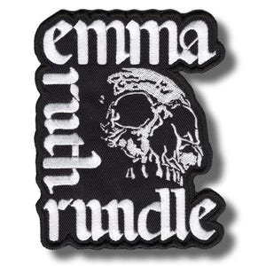 May include: Black embroidered patch with white text and a skull graphic. The patch reads "emma ruth rundle" in a gothic font. The skull graphic is detailed with shading and highlights.