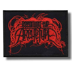 May include: Black rectangular patch with red embroidered text and decorative elements. The text reads "SECTORIS ARCHIPELAGO" in a gothic font. The patch is likely for clothing or accessories.