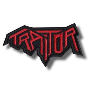 May include: Embroidered patch featuring the word "TRATOR" in bold, red lettering. The text is set against a black background with a jagged, angular border. The patch is designed with a shadow effect, giving it a three-dimensional appearance.