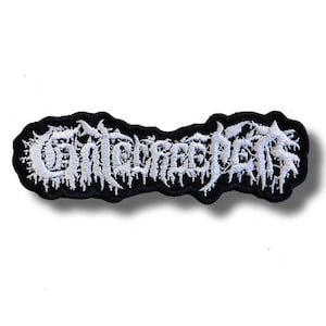 May include: A black embroidered patch with the word "Contorted" in white, stylized, gothic lettering. The patch has a black border and a white, dripping effect on the letters, giving it a heavy metal aesthetic.