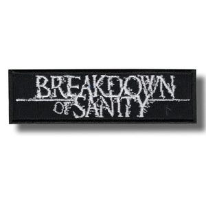 May include: A black rectangular patch featuring the white embroidered text "BREAKDOWN OF SANITY". The patch has a black border and is designed to be attached to clothing or bags as a decorative item.