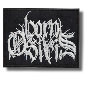 May include: Black rectangular patch with white embroidered text that reads "Born of Osiris" in a stylized, gothic font. The patch has a black border and is likely for clothing or accessories.