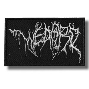 May include: Black rectangular patch with white embroidered text. The text has a stylized, gothic font with a dripping effect. The patch is likely for clothing or accessories.
