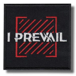 May include: Black square patch with white embroidered text reading "I PREVAIL". The text is within a red square with diagonal red lines. The patch has a black border.