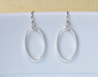 Sterling silver twisted oval hoop dangle earrings