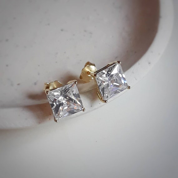 Clear cubic zirconia stud earrings - gold