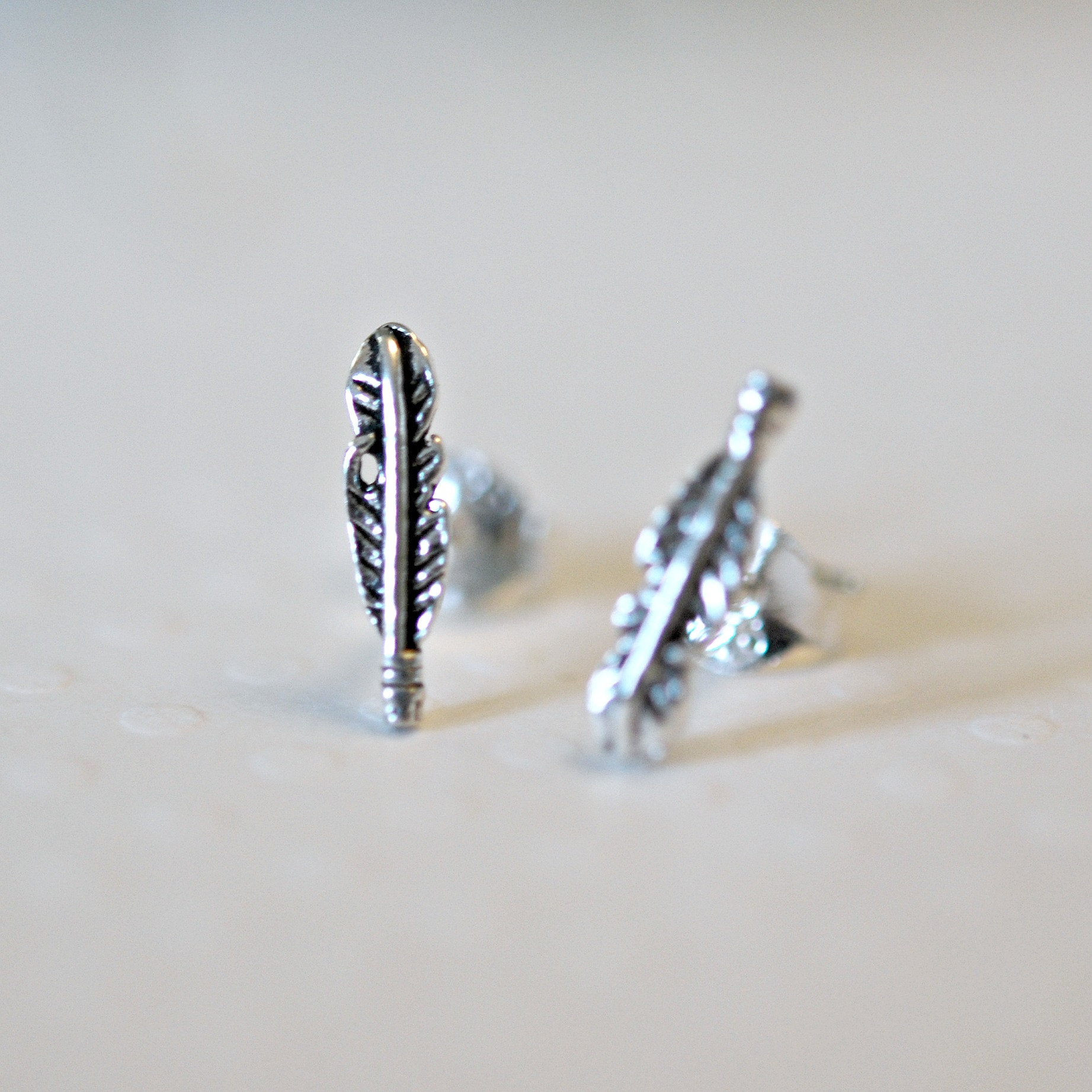 sterling silver feather stud earrings