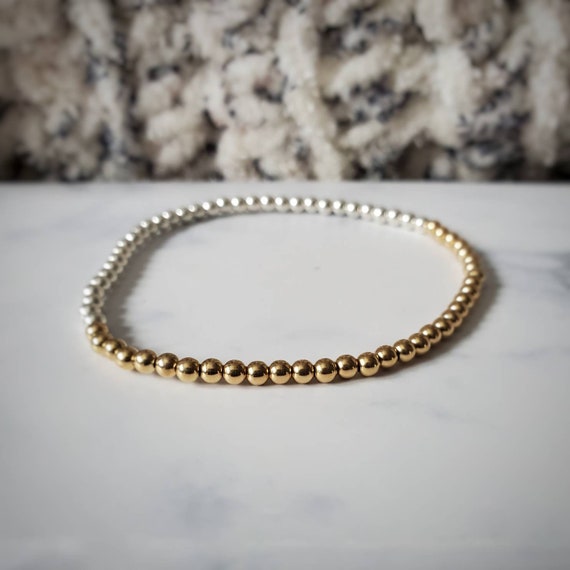 Sterling silver and gold ball bracelet