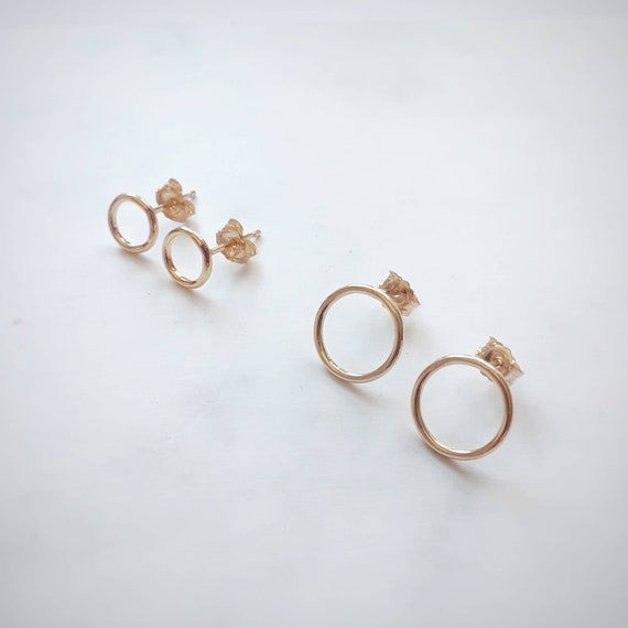 Gold circle stud earrings