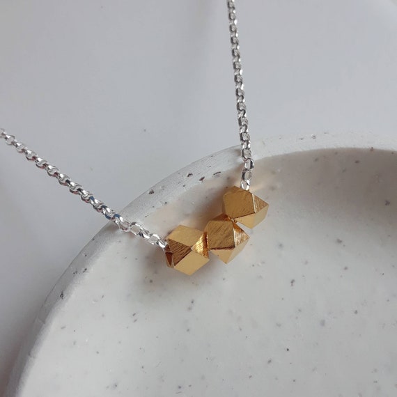 Three gold nuggets necklace