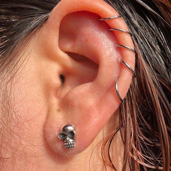 Sterling silver skull studs