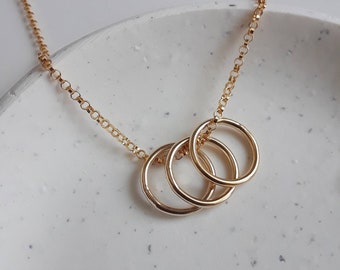 Three gold rings necklace, modern gold circle necklace, simple jewelry, gold necklace, eternity necklace, past present future karma necklace