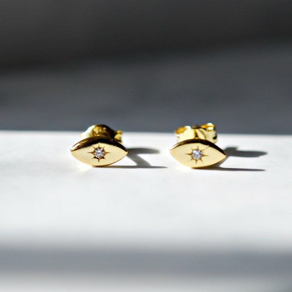 Evil eye stud earrings with cubic zirconias