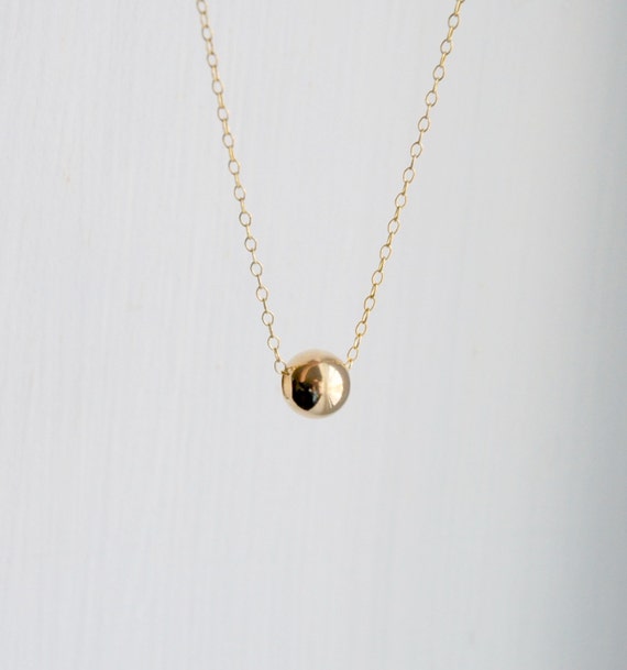 Gold ball necklace