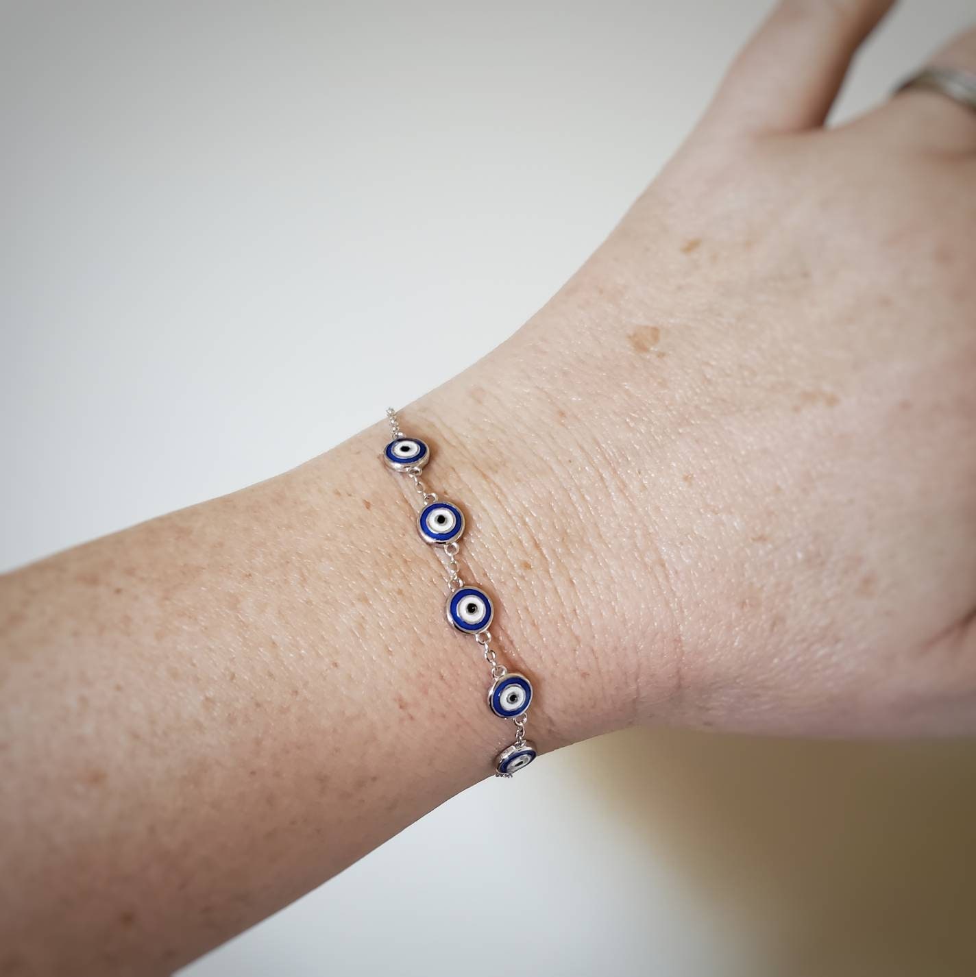 Sterling silver multi evil eye bracelet