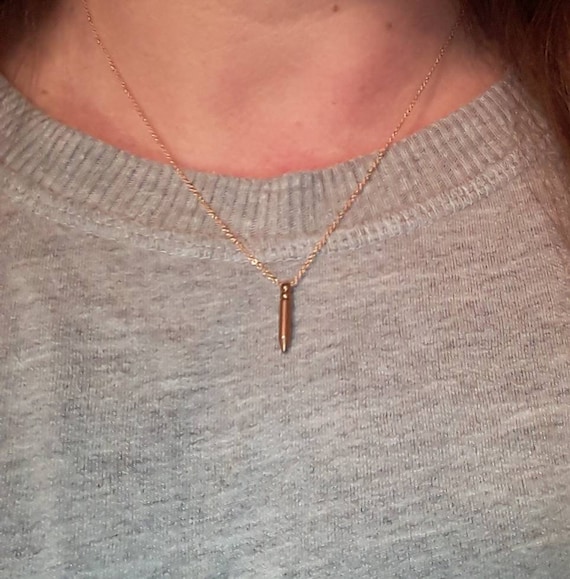 Gold bullet necklace, brass bullet pendant, tiny bullet, gold spike, gold chain, edgy necklace, minimalist, modern jewelry