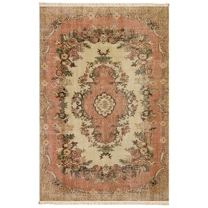 May include: A rectangular, vintage-style rug with a central cream-colored field and a surrounding border in a muted coral hue. The rug features a floral pattern with accents of green and brown, and a fringed edge.