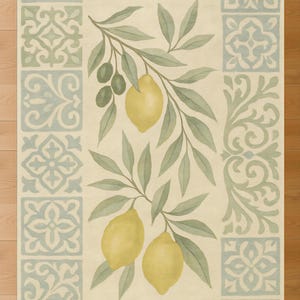 a rug with a design of lemons and leaves, creating a decorative and nature-inspired pattern.