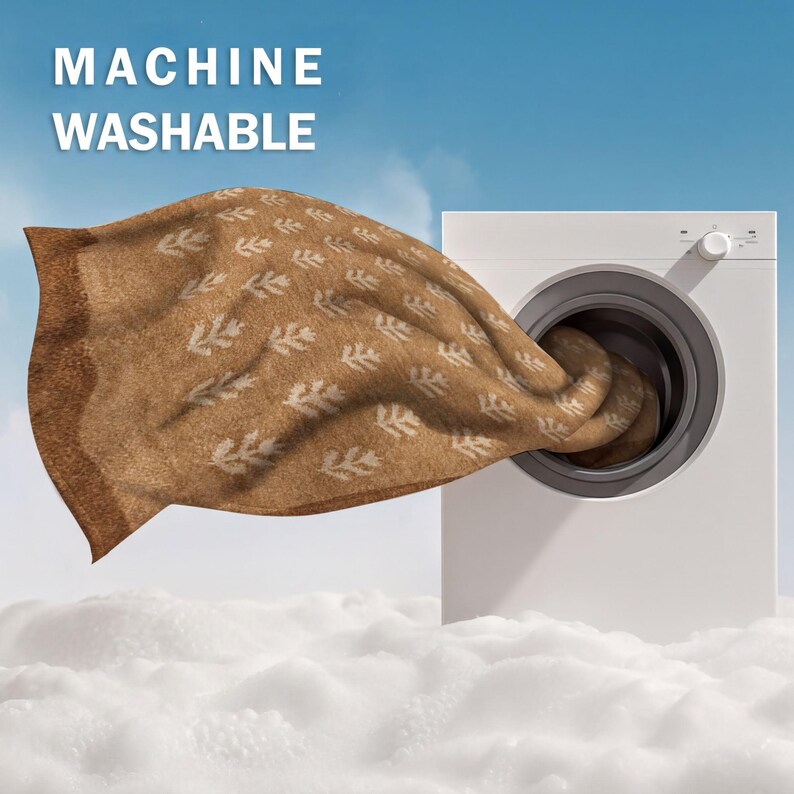 a white washing machine with a brown towel hanging out of it, set against a backdrop of fluffy white clouds.
