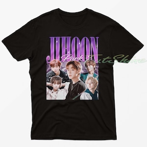 May include: Black t-shirt with a vintage design featuring a group of young men and the name "JIHOON Park" in purple. The shirt has a retro aesthetic, with a faded appearance.
