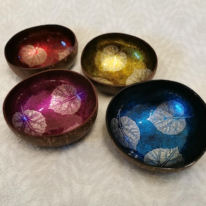 Coconut shell with filigree leaf patterns