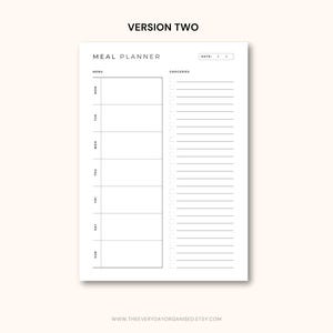May include: A white meal planner with a minimalist design. The planner includes sections for each day of the week, a menu section, and a grocery list. The text "VERSION TWO" is at the top. The website address is at the bottom.