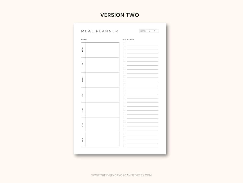 May include: A white meal planner with a minimalist design. The planner includes sections for each day of the week, a menu section, and a grocery list. The text "VERSION TWO" is at the top. The website address is at the bottom.