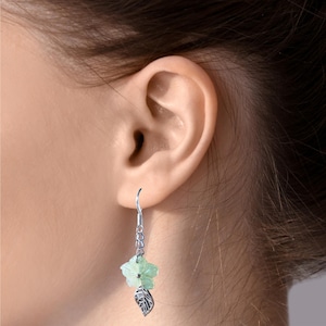 Flower and leaf earrings, shimmering green