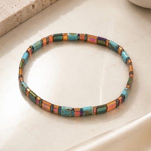 Miyuki Tila Bead Bracelet: Marbled Blue & Transparent Orange Stretch Bracelet