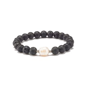 May include: A black lava rock beaded bracelet with a single white pearl accent.