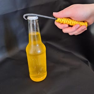 Hand forged rustic bottle opener