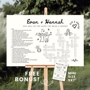Könnte beinhalten: Ein weißes Hochzeitskreuzworträtsel auf einer Staffelei mit den Namen "Evan + Hannah" oben. Das Rätsel enthält Hinweise auf das Paar. Eine kleinere Version von 12,7 cm x 17,8 cm ist als kostenloser Bonus enthalten.