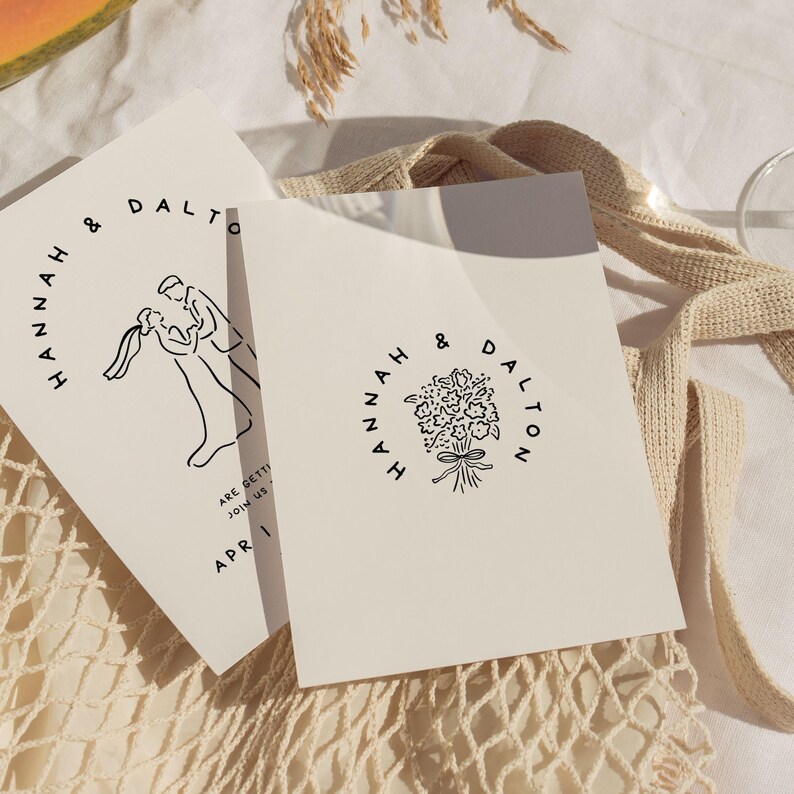 May include: Two off-white wedding invitations with black text and illustrations. One features a couple dancing, the other a bouquet of flowers. Both read "Hannah & Dalton" and include the date "Apr 1".